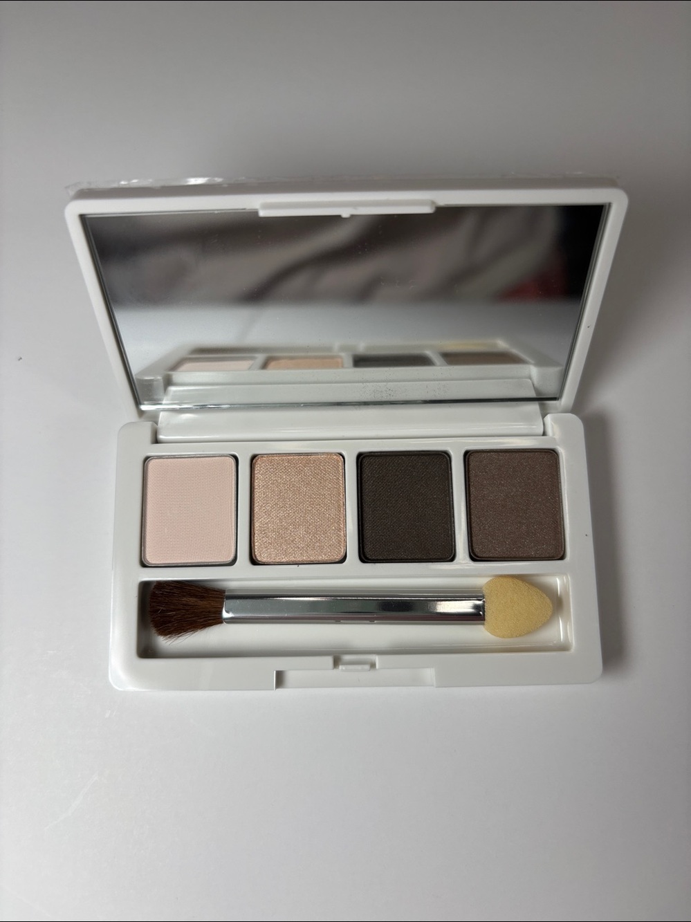 New 
Clinique Color Surge Eyeshadow Quad teddy bear, neutral & shimmer.